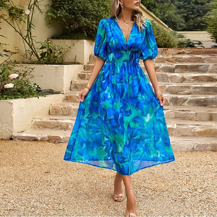 "Women's casual V-neck midi dress in breathable cotton, features short sleeves and a relaxed silhouette for summer comfort."