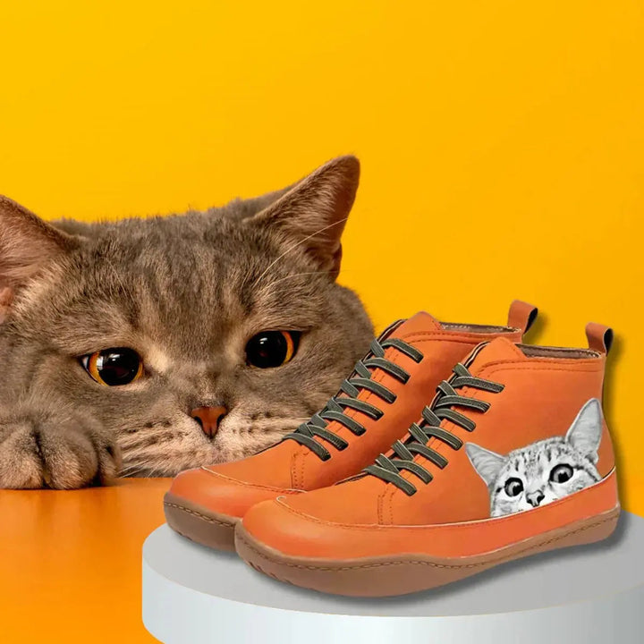 Casual women's comfort flat ankle boots with a charming cat print design & secure lace-up closure.