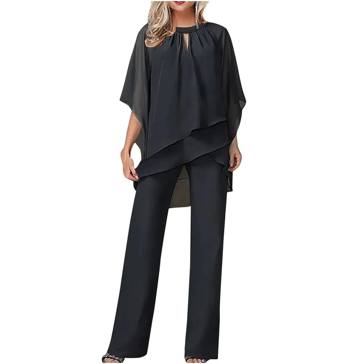 Sophisticated women's batwing keyhole top and wide leg pants set, perfect for formal events or evening outfits.
