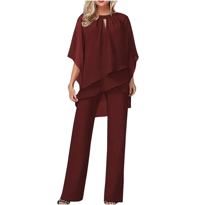 Elegant women's batwing keyhole top & wide leg pants set. Comfortable and sophisticated occasion wear outfit.
