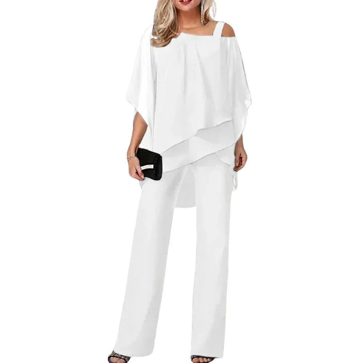 Versatile women's outfit: stylish batwing-sleeve keyhole top paired with comfortable wide-leg pants. Two-piece set.