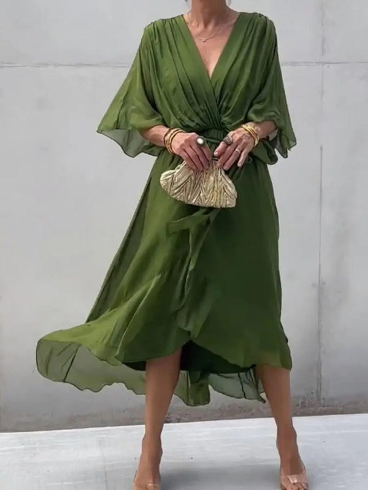 Chic women's V-neck midi cocktail dress with belt, a beautiful option for wedding guest attire.