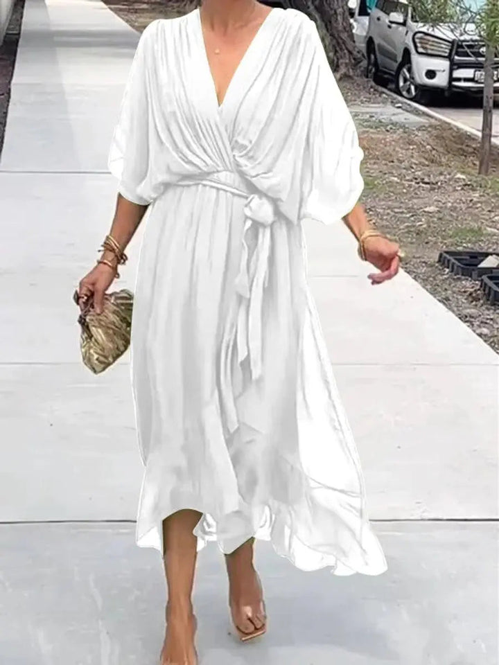 Elegant women's V-neck midi party dress with belt, perfect for wedding guests.