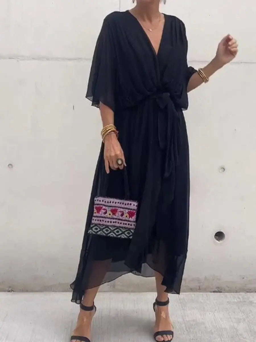 Flowy chiffon V-neck midi dress for women, belted and stylish for evening wear.