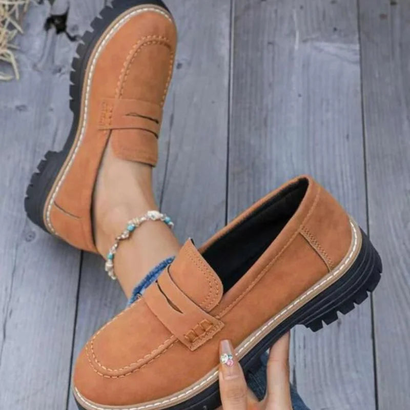 Fashion-forward women's chunky platform loafers. Slip-on penny strap shoes offer a bold, modern silhouette.