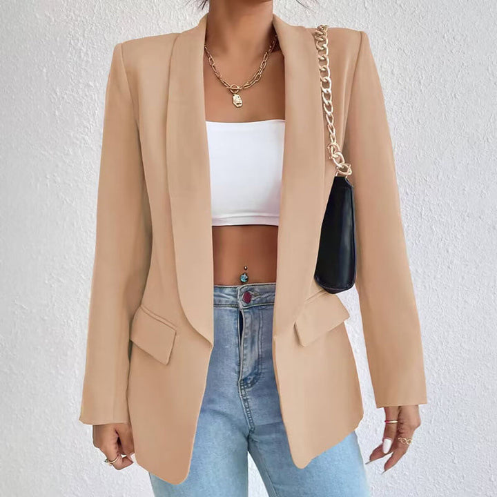 "Women's classic tailored blazer, elegant silhouette, versatile styling for business or casual, timeless appeal, formal look"