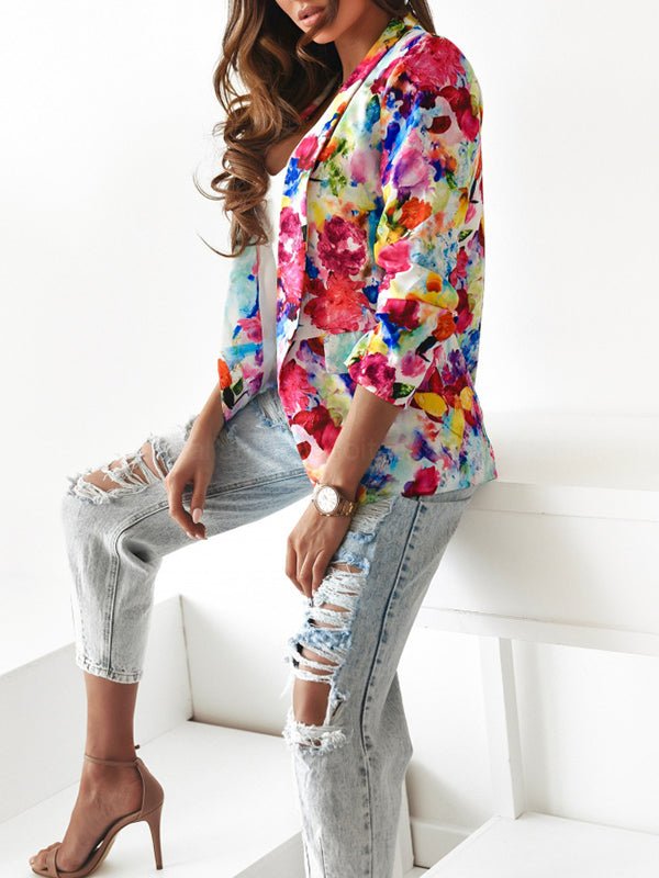 Vibrant women's floral print blazer, a chic outerwear piece for business casual style & office fashion.