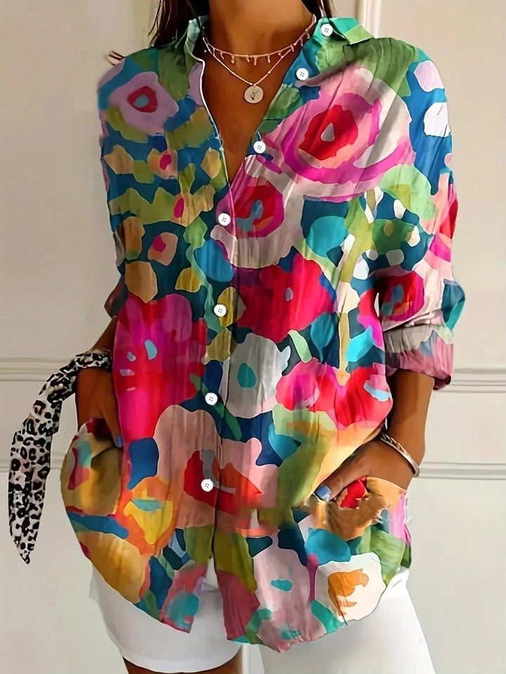 Casual women's colorful long sleeve blouse, artistic floral print, loose fit and button-front style.