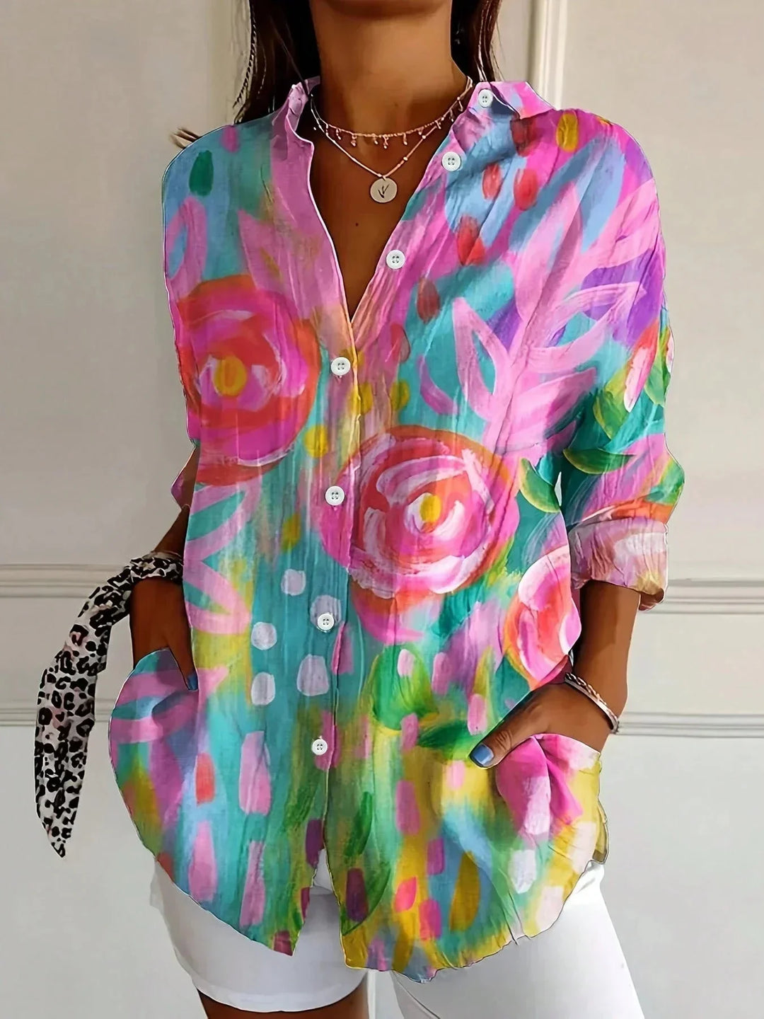 Women's vibrant artistic floral print long sleeve blouse with button front, loose fit for casual elegance.