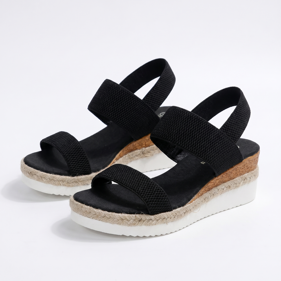 Stylish women's slip-on sandals, orthopaedic design, arch support, comfortable wedge heel.