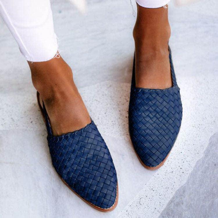 "Women's comfortable woven leather slingback flats, closed toe, with secure strap and elegant design for versatile wear."