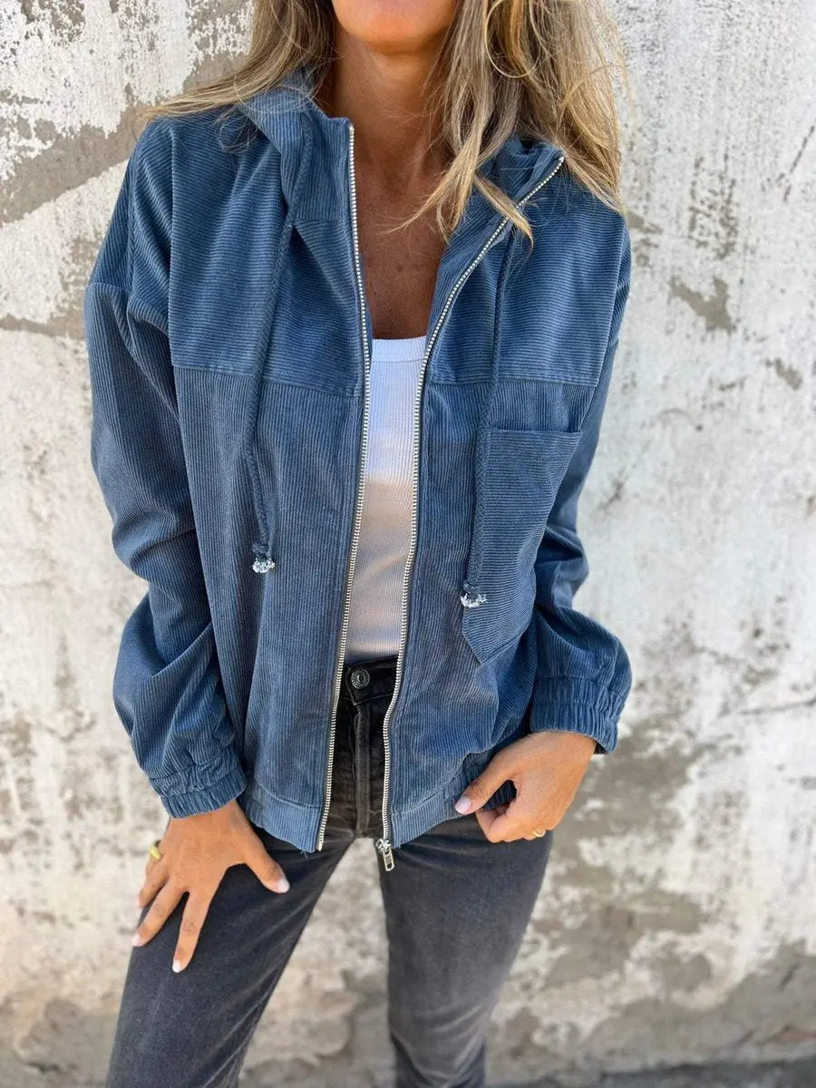 Women's oversized corduroy hooded zip-up quilted jacket in a relaxed fit. Perfect casual fall outerwear.