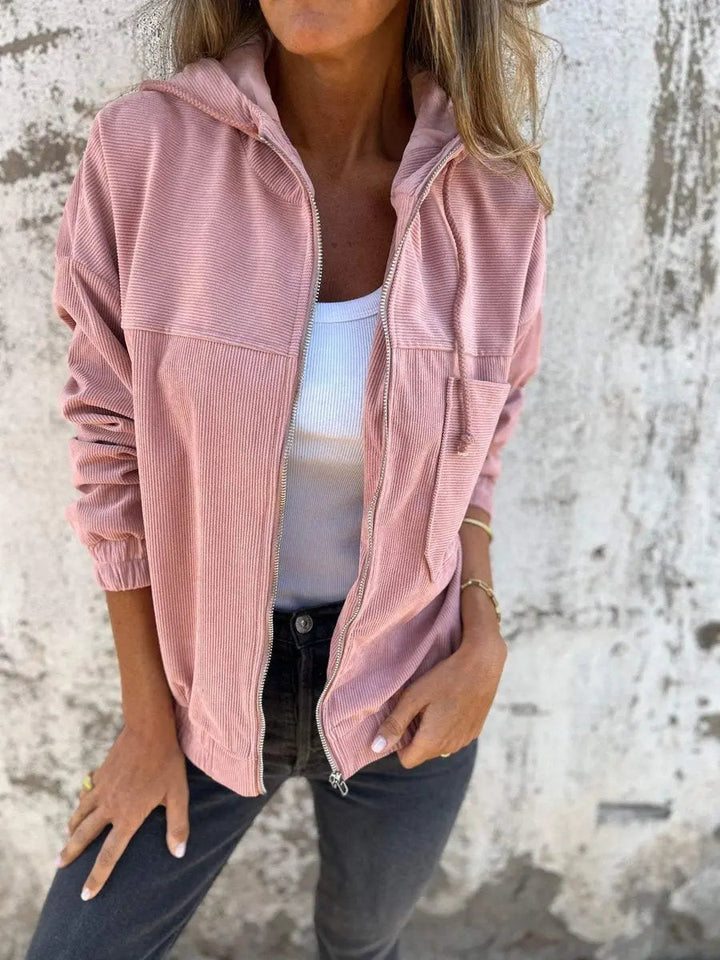 Comfortable women's oversized & relaxed fit corduroy quilted jacket with hood & zip-up. Ideal for casual fall fashion.