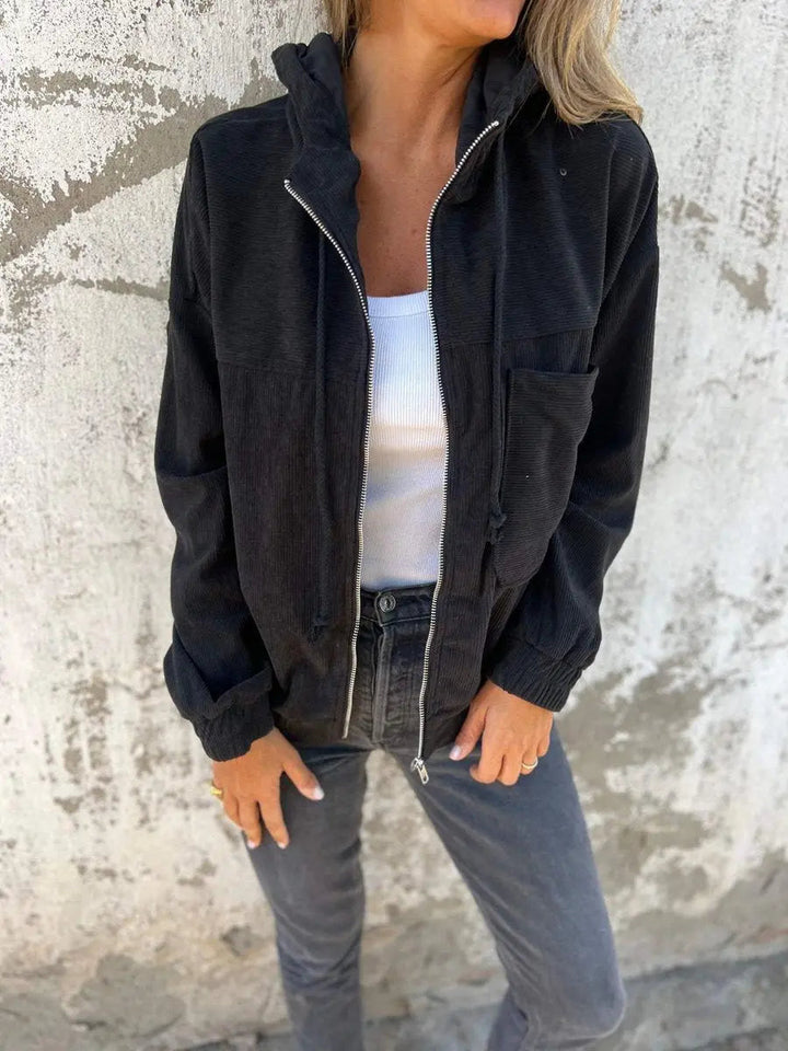 Women's cozy corduroy quilted zip-up jacket. Oversized, hooded design for a relaxed fit. Versatile fall & spring outerwear.