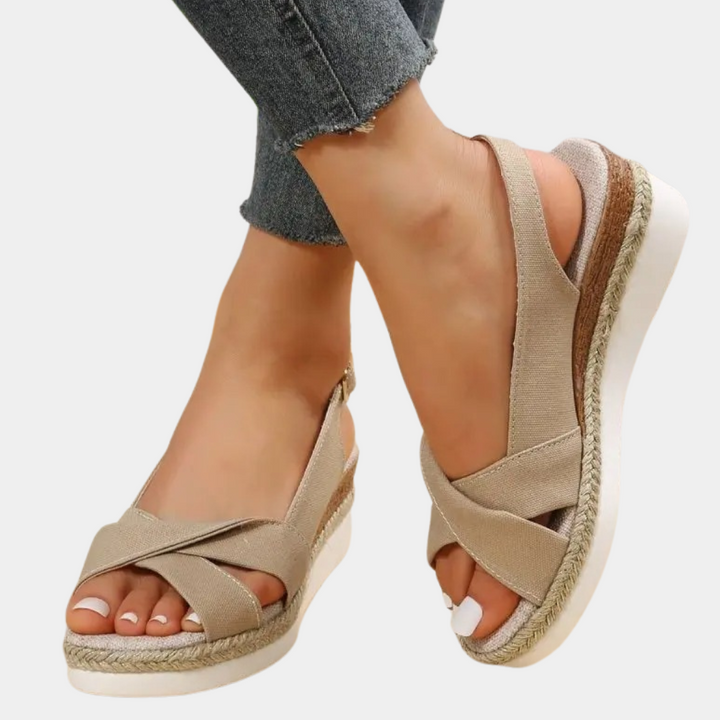 Women's cotton espadrille flats with multicolor pattern, breathable upper, and durable sole for comfort and style.