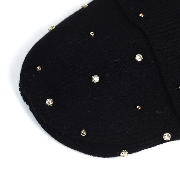 Soft knit embellished hat for women, a comfortable and warm accessory with a festive sparkle design.