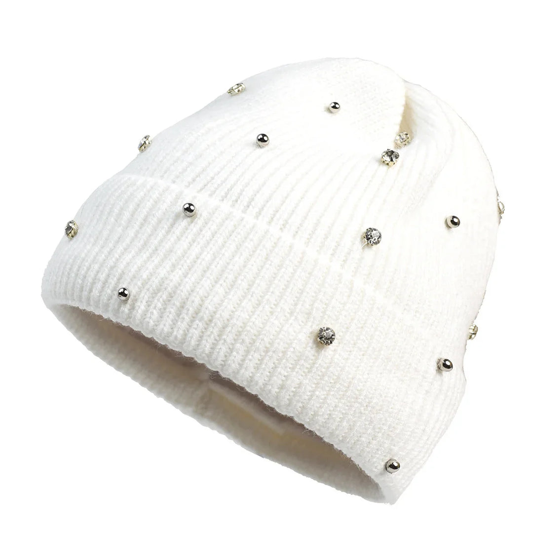 Chic women's winter hat, a cozy fold-over beanie adorned with dazzling rhinestones for added style.
