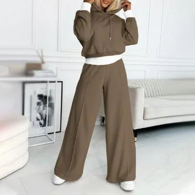 Women's comfortable two-piece set: soft hoodie and trendy wide-leg pants. Perfect for chic home or casual wear.