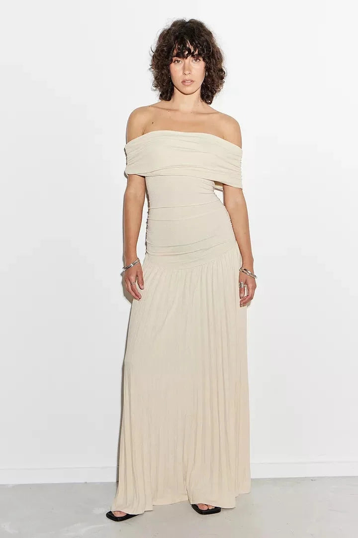 Cream off-shoulder maxi dress for women, flowy and elegant summer style with a comfortable fit.