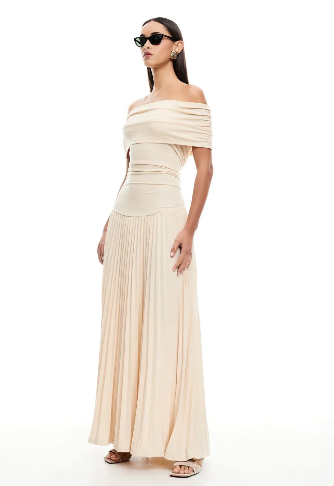 Front view: Women's cream flowy off-shoulder maxi dress, elegant summer style for any occasion.
