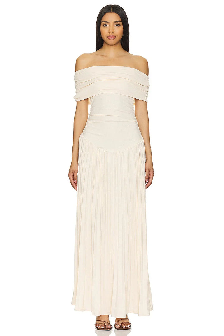 Casual yet elegant cream off-shoulder maxi dress, flowy summer style for women's special occasions.