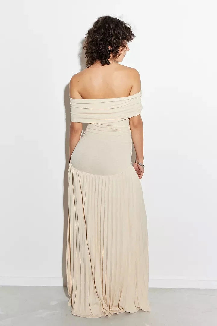 Women's cream off-shoulder maxi dress with a beautiful pleated skirt, flowy and elegant for summer.