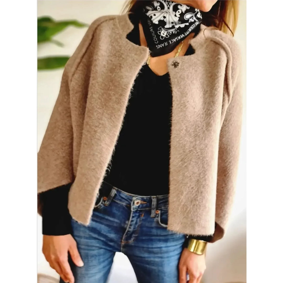 Stylish women's cropped cardigan with wide sleeves & stand collar. Soft knit for comfort.