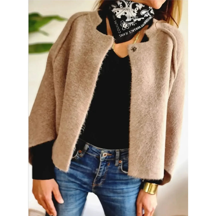 Stylish women's cropped cardigan with wide sleeves & stand collar. Soft knit for comfort.