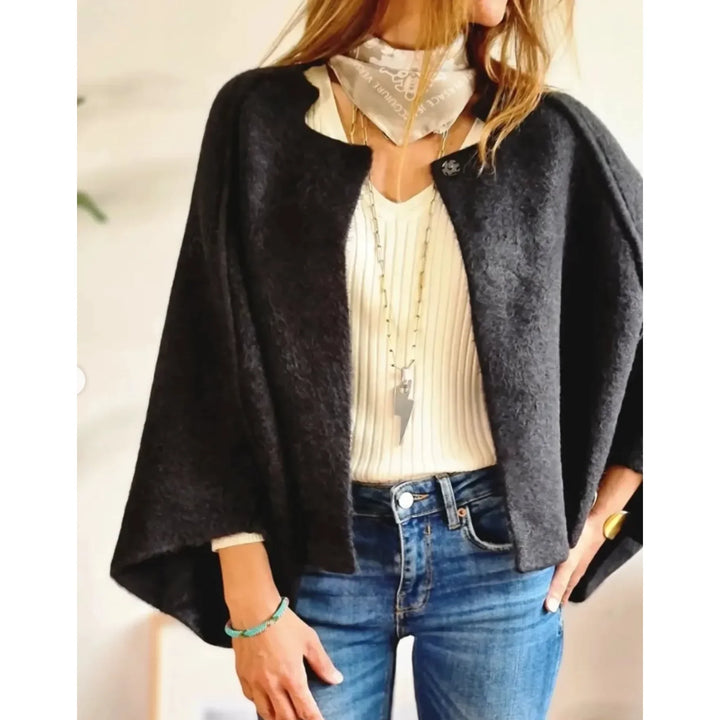 Layering women's cropped soft knit cardigan. Wide sleeves, stand collar. Elegant casual fashion.