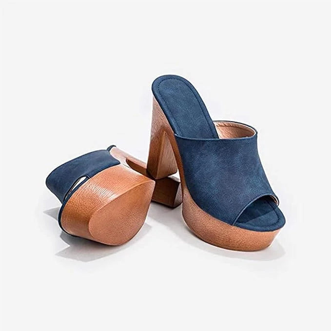Elegant women's dark blue sandals featuring a comfortable platform and chunky heel.