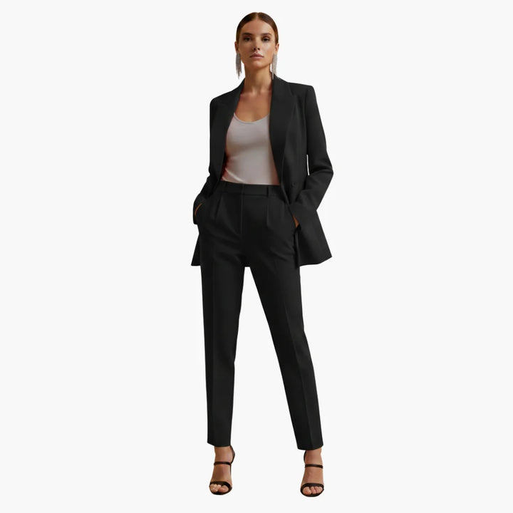 Office fashion women's tailored double-breasted blazer and trousers suit.