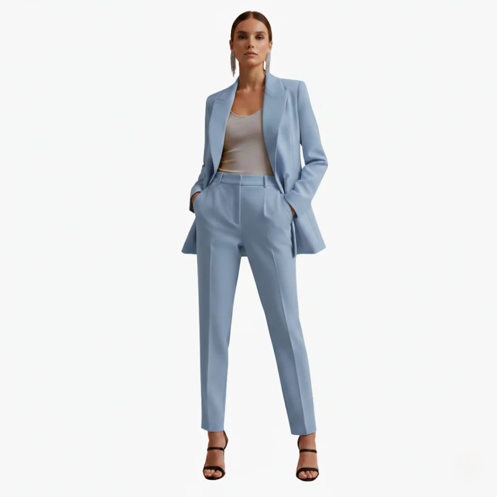 Elegant women's two-piece formal suit with tailored double-breasted blazer & trousers.