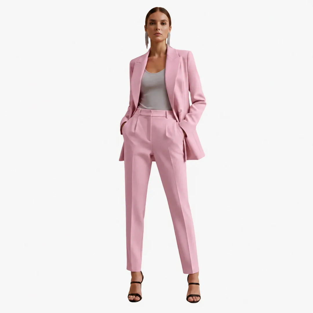 Sophisticated women's tailored double-breasted blazer and trousers for formal attire.