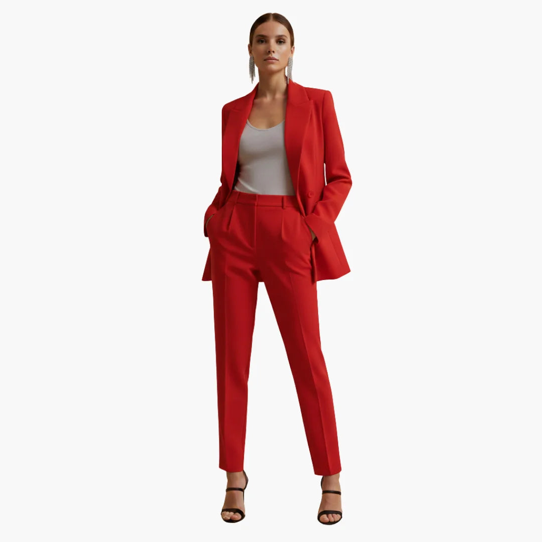 Two-piece women's formal wear: tailored double-breasted blazer & matching trousers.