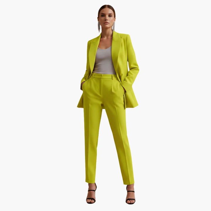 Chic women's tailored double-breasted blazer & trousers set for professional elegance.