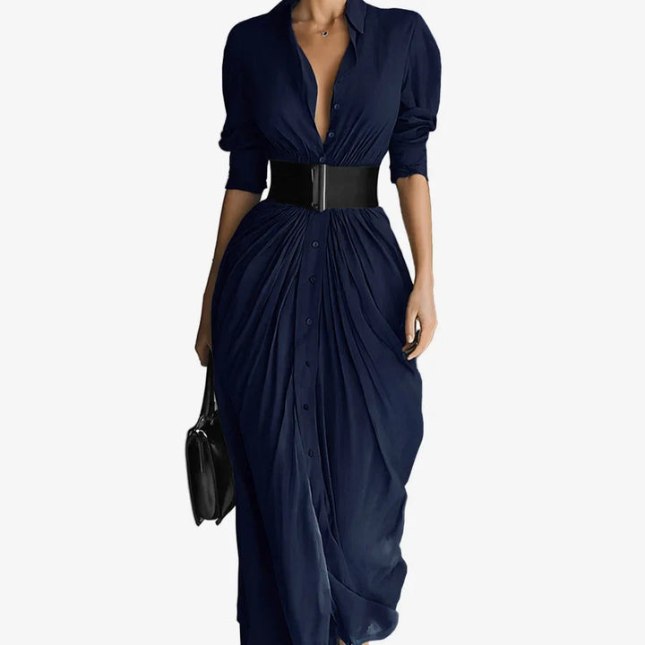 Close-up of women's V-neck long sleeve midi dress with elegant drape and detailed button front.