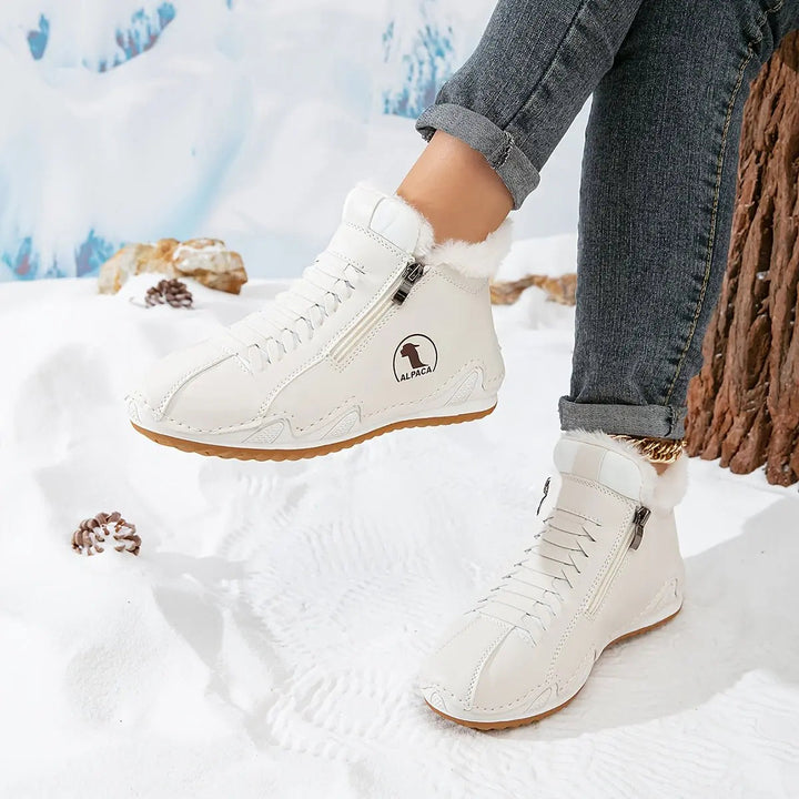 Cozy faux-fur lined women's ankle boots, zip-up design, ideal for winter everyday wear.