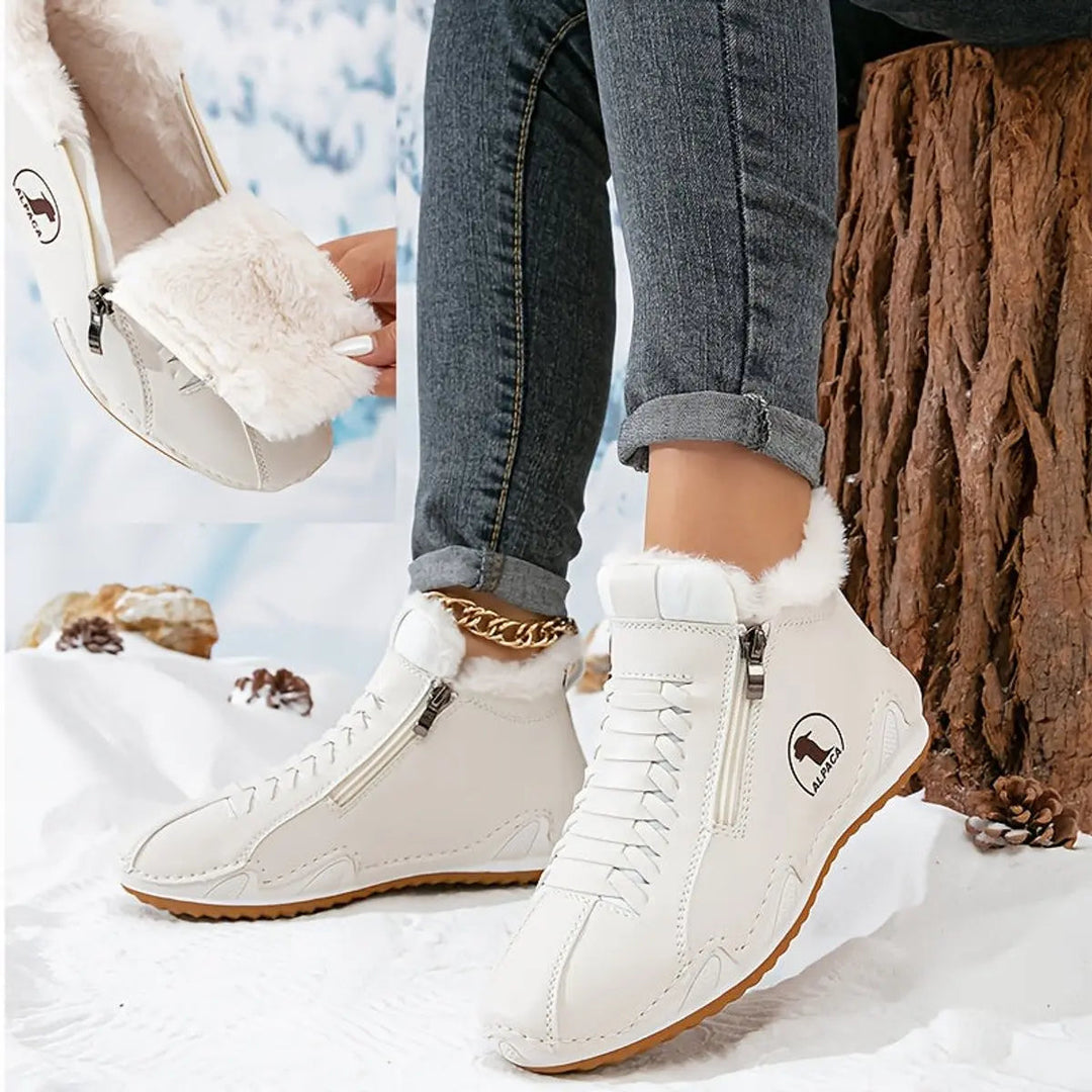 Warm women's comfort boots, zip-up ankle style, excellent for cold weather & snow friendly.