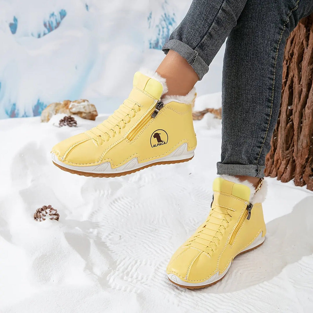 Stylish women's cold weather boots, wide fit, with plush faux-fur lining and zip-up entry.