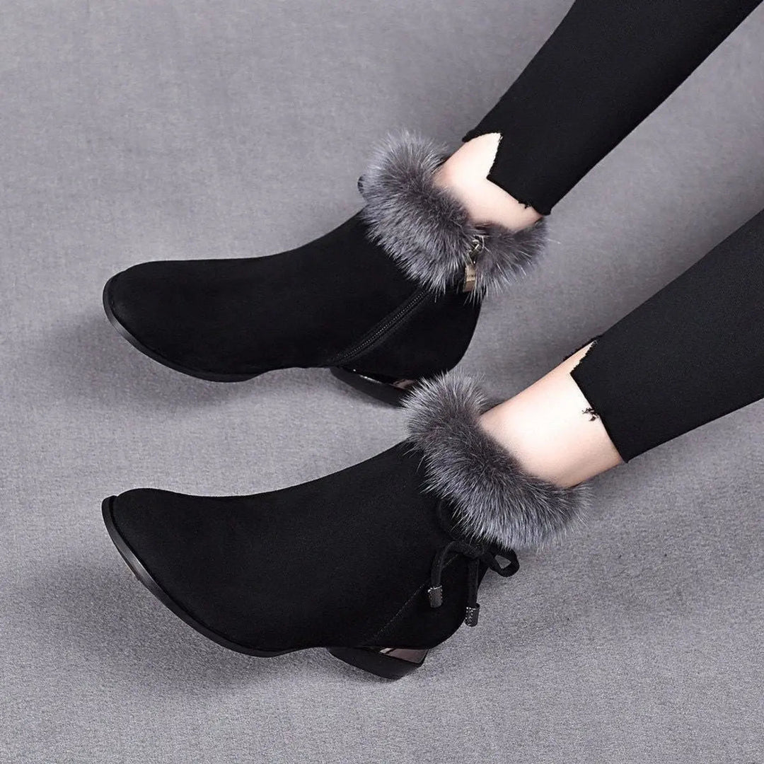 Comfortable women's everyday flat ankle boots, ideal for cozy winter & fall wear.