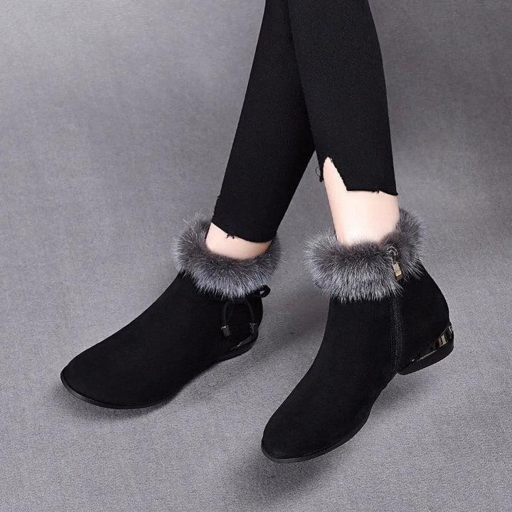Warm women's flat ankle boots, designed for comfort & coziness during fall & winter.