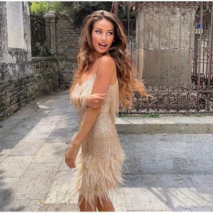 "Women's feather mini dress with elegant detailing, chic silhouette and luxurious feather accents for special occasions."