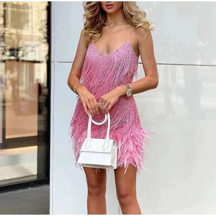 "Women's feather mini dress with elegant detailing, chic silhouette and luxurious feather accents for special occasions."