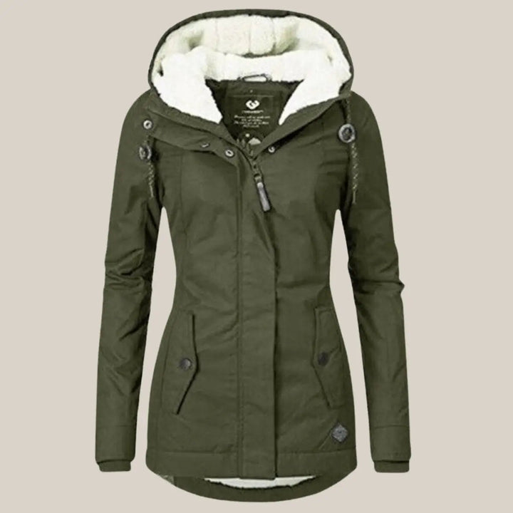 Detail of the interior fleece lining of a warm women's hooded quilted winter jacket.