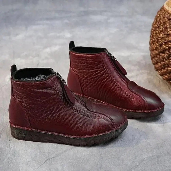 Comfortable women's everyday ankle boots, zip-up style, warm lining & non-slip grip for cold weather.