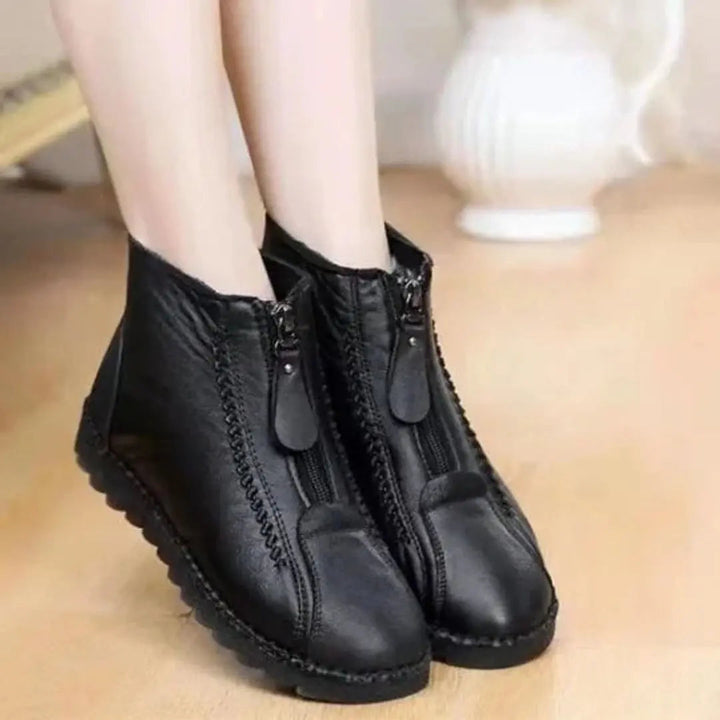 Practical women's warm ankle boots, easy zip-up access, non-slip design for fall and winter comfort.
