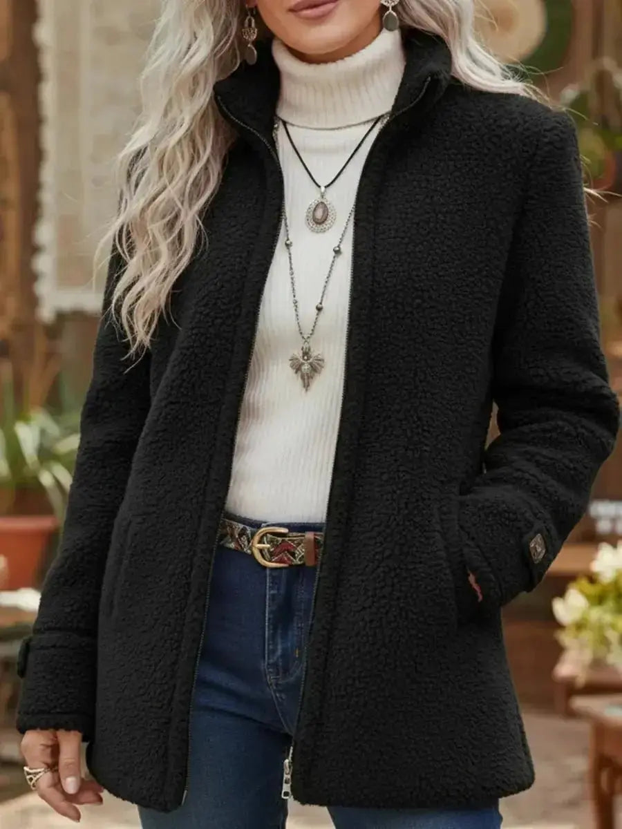 Soft women's cozy fleece zip-up coat, a stylish and warm stand collar jacket for cold weather outerwear.