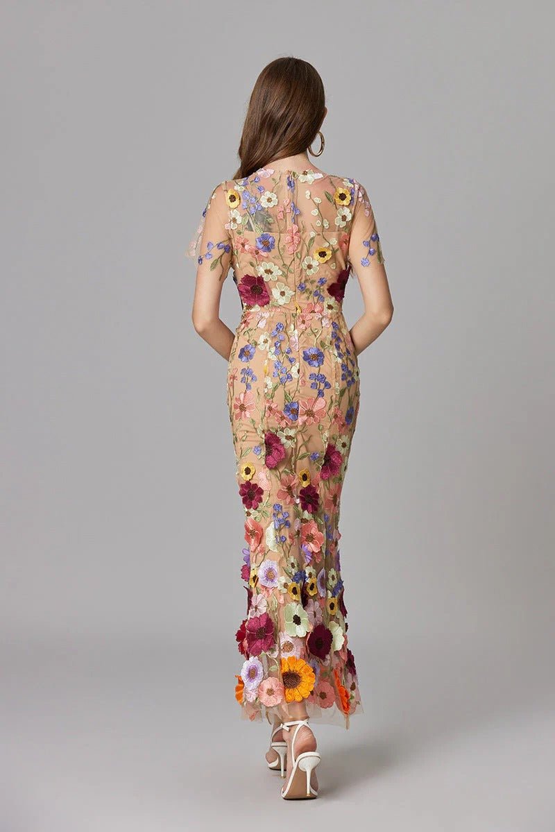 Women's elegant Scarlett maxi dress, sleeveless, with beautiful floral applique details.