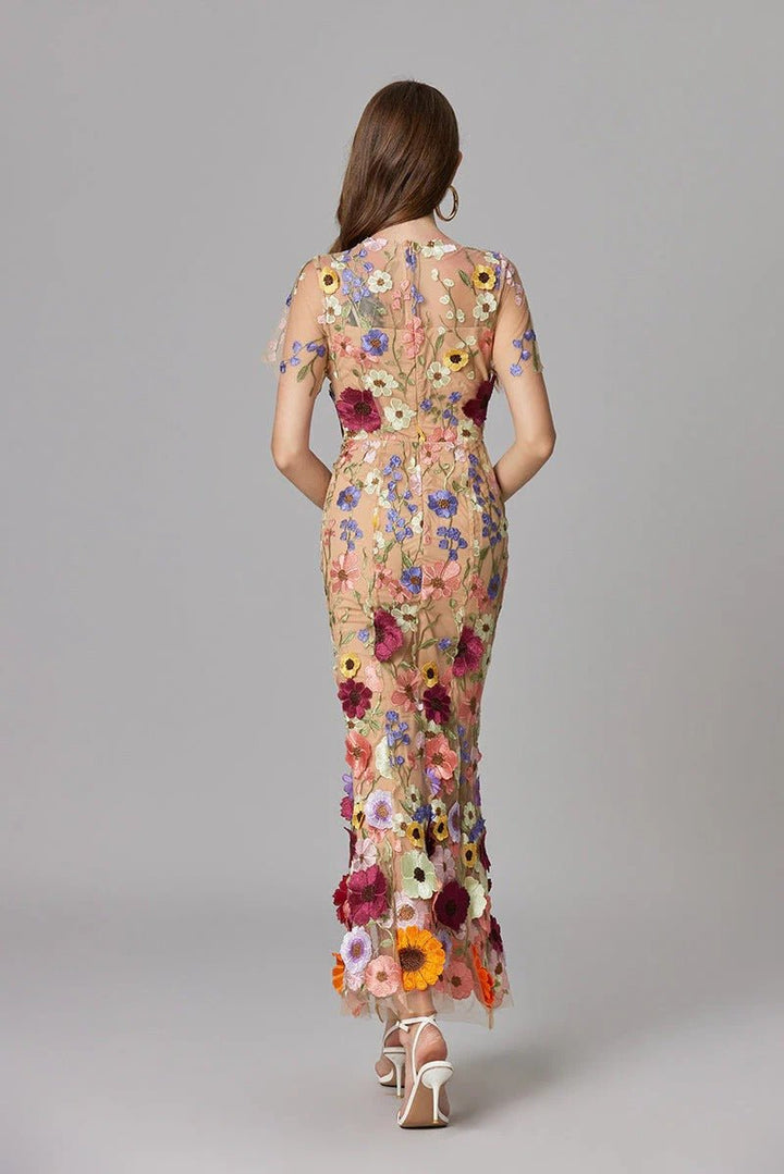 Women's elegant Scarlett maxi dress, sleeveless, with beautiful floral applique details.
