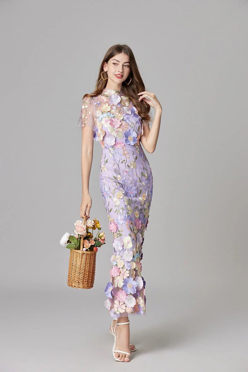 Party-ready Scarlett sleeveless maxi dress with delicate floral appliques. Women's formal wear.